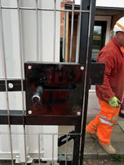 Picture of gate fitted with retofitted plate