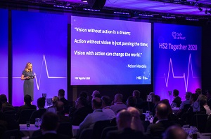Picture of Safe at heart conference tin March 2020 with a speaker on stage 
