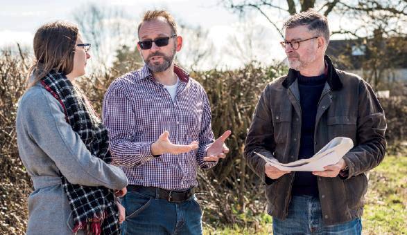 3 HS2 landscape architects on site discussing local planting design.