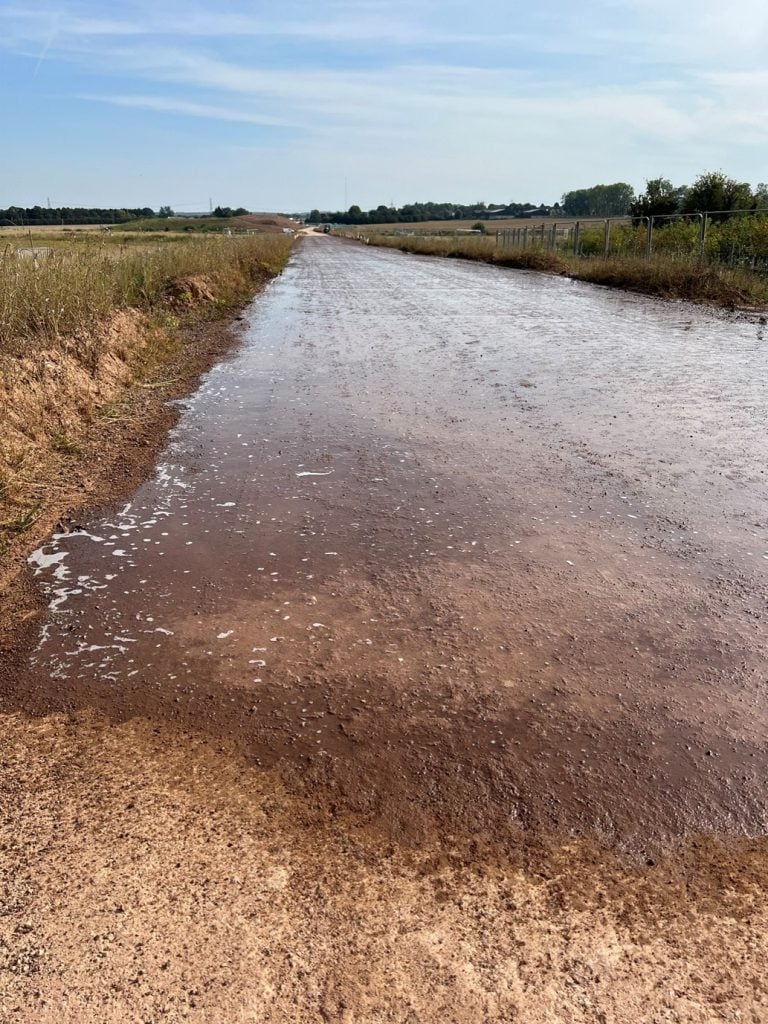 Picture of wet haul road after application.