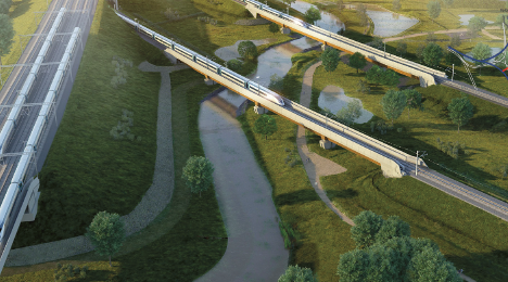 A high angle view of a train bridge over the River Cole 

