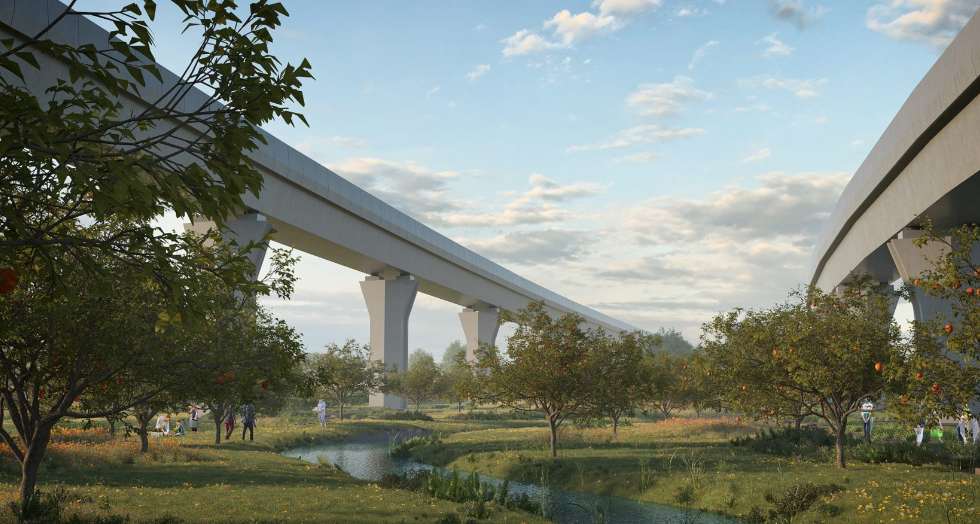 A long white bridge over a the River Cole
