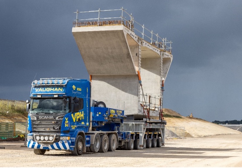 Figure 6 - Transportation of a Colne Valley Viaduct segment from the onsite precast factory to the installation site. Each segment weighs up to 140 Tonnes.